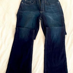 Riders by Lee size 8M mid rise bootcut dark blue jeans.